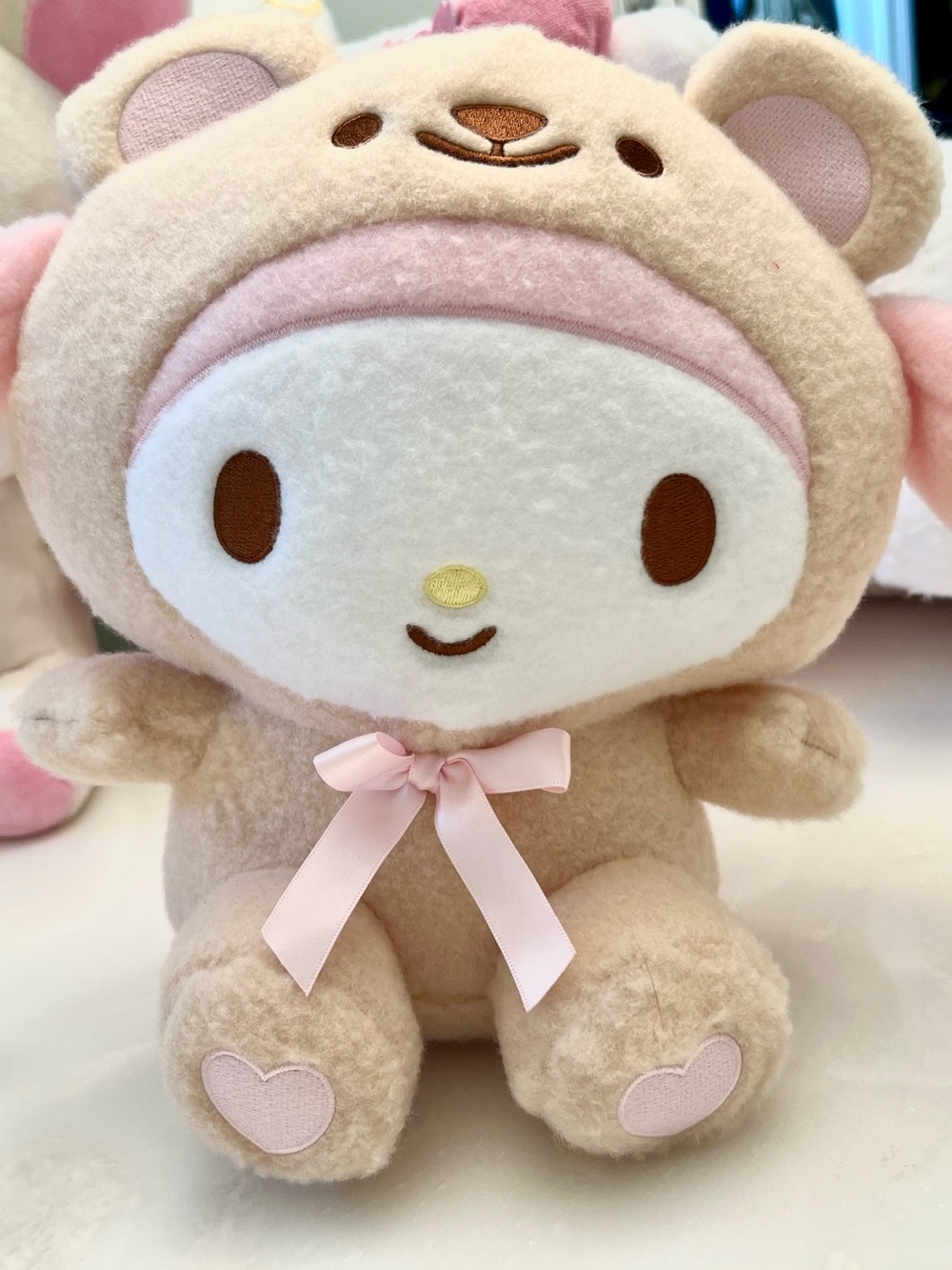 My melody plush in wool boa bear costume